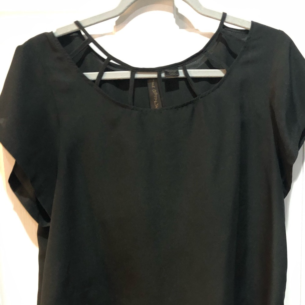Black short sleeve blouse with cutout neckline